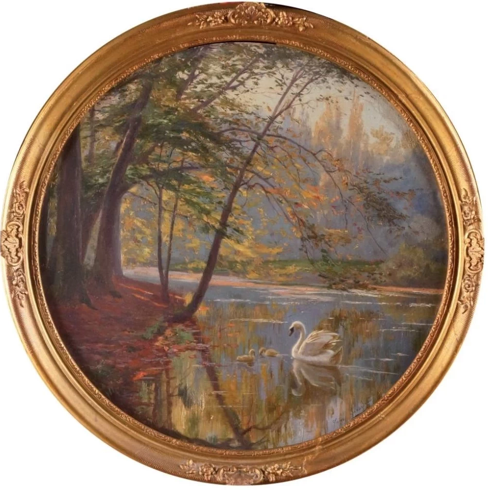 Il cigno e i suoi piccoli in autunno